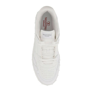 Leather Freedots Low Top Sneakers.