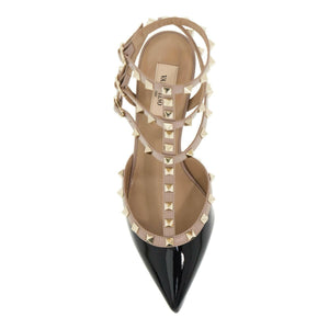 Patent Rockstud Caged Slingback Pumps.