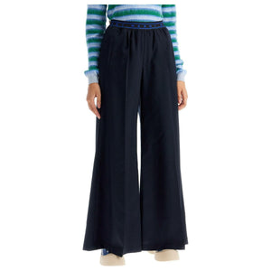 Flared Wool Trousers.