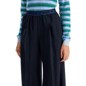 Flared Wool Trousers.