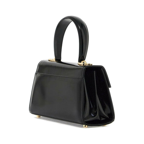 Iconic Top Handle Handbag.