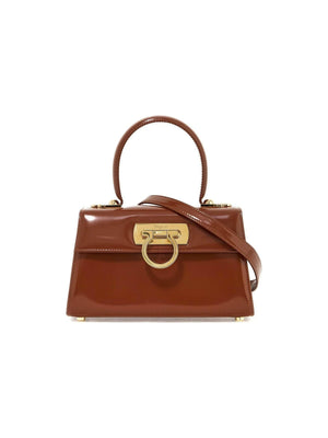 Iconic Top Handle Handbag.