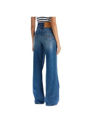 High-waist blue jeans with leather patch, inspired by Jean Paul Gaultier style