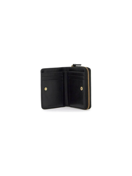 The Leather Mini Compact Wallet.