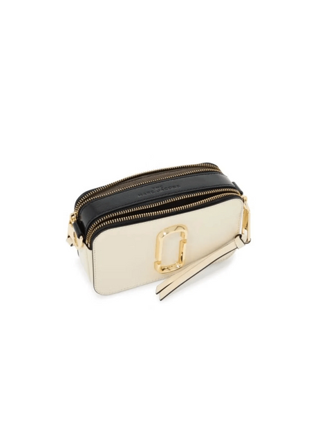 Two-tone leather Snapshot Camera Bag with gold hardware and zippered compartments