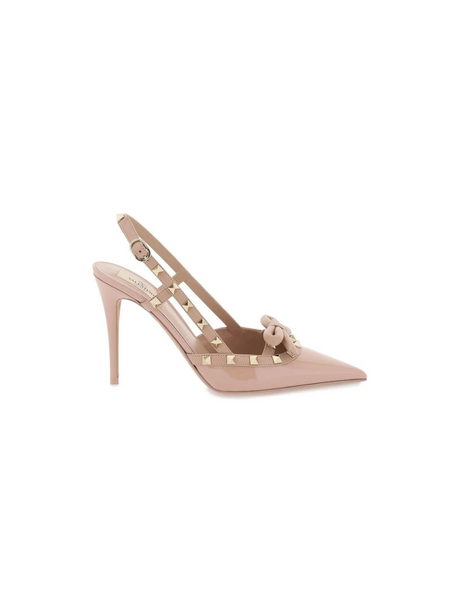 Rockstud Bow Patent Slingback Pumps.